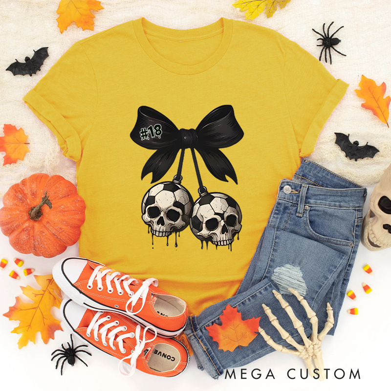 Personalized Spooky Soccer T-Shirt Featuring Custom Number and Skull Graphics 