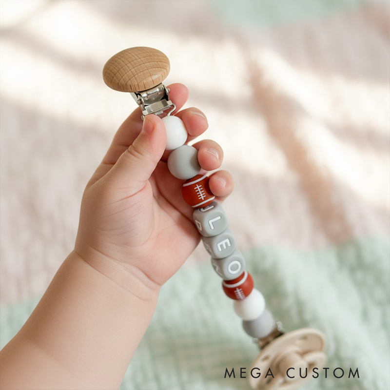 Personalized Football Pacifier Clip Add Newborn Baby Boy or Girl Name Custom Baby Shower New Football Mom Gift