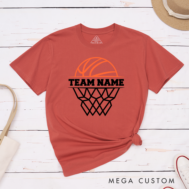 Personalized Basketball Team T-Shirt Design Featuring Custom Team Name Bold Text Dynamic Orange Basketball Graphic and Stylized Hoop Illustration