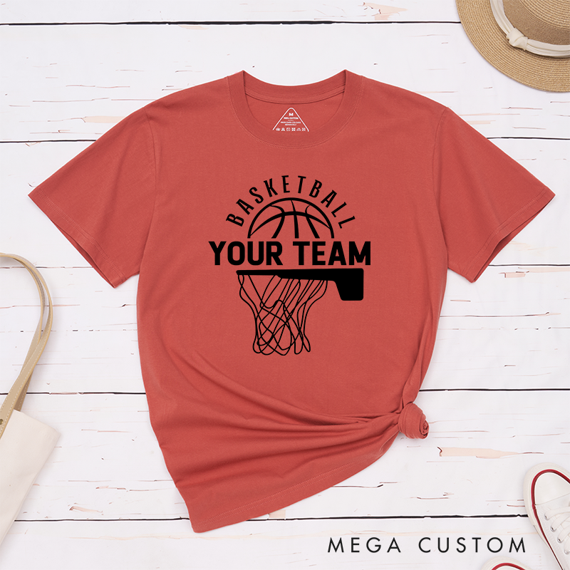 Personalized Basketball T-Shirt Design Showcasing Custom Team Name Bold Basketball Graphic Dynamic Hoop and Net Illustration and Stylish Arched Text Layout