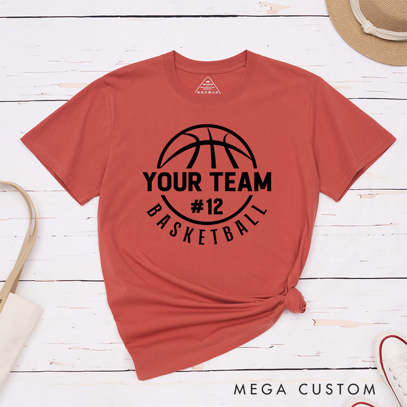 Personalized Basketball T-Shirt Design Featuring Custom Team Name Circular Basketball Graphic Player Number and Stylish Arched Text