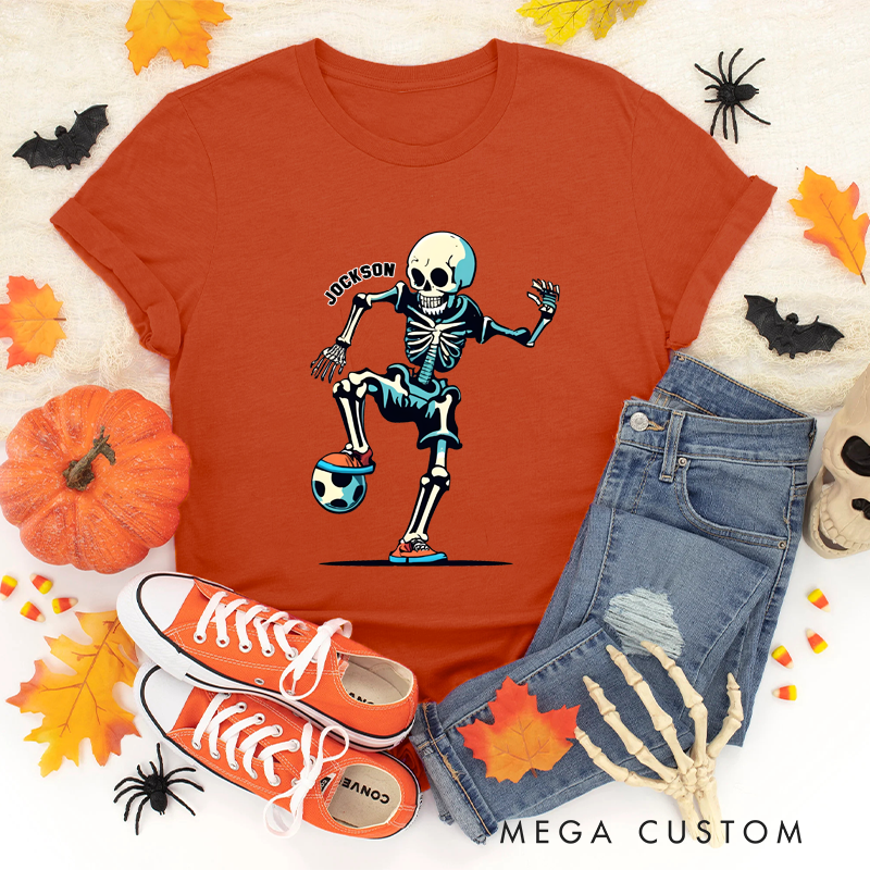 Personalized Halloween Soccer T-Shirt with Skeleton Kicking a Ball and Custom Name Design