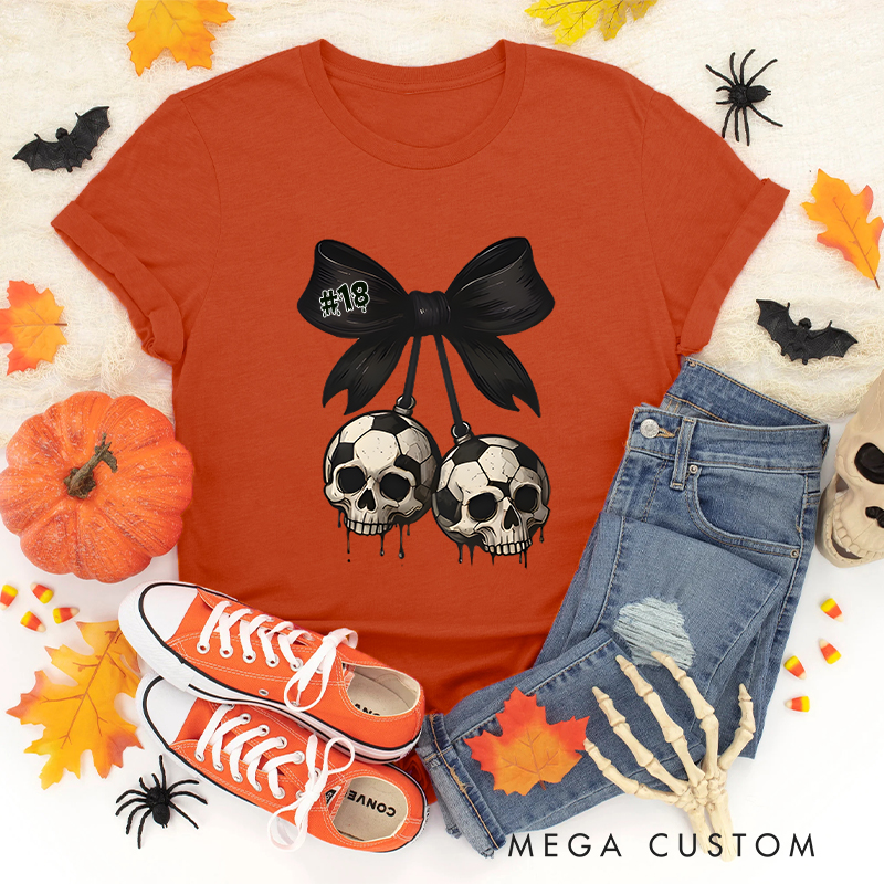 Personalized Spooky Soccer T-Shirt Featuring Custom Number and Skull Graphics 