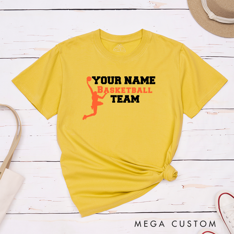 Personalized Basketball Team T-Shirt Design Featuring Custom Name Bold Text and Dynamic Player Silhouette Graphic