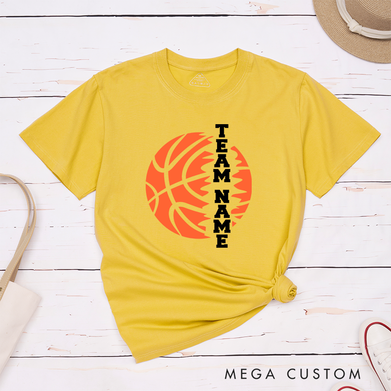Personalized Basketball Team T-Shirt Design Featuring Custom Team Name Vertical Bold Text Flaming Orange Basketball Graphic