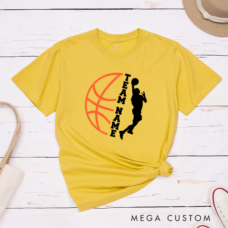 Personalized Basketball Team T-Shirt Design Featuring Custom Team Name Player Silhouette Bold Orange Basketball Graphic