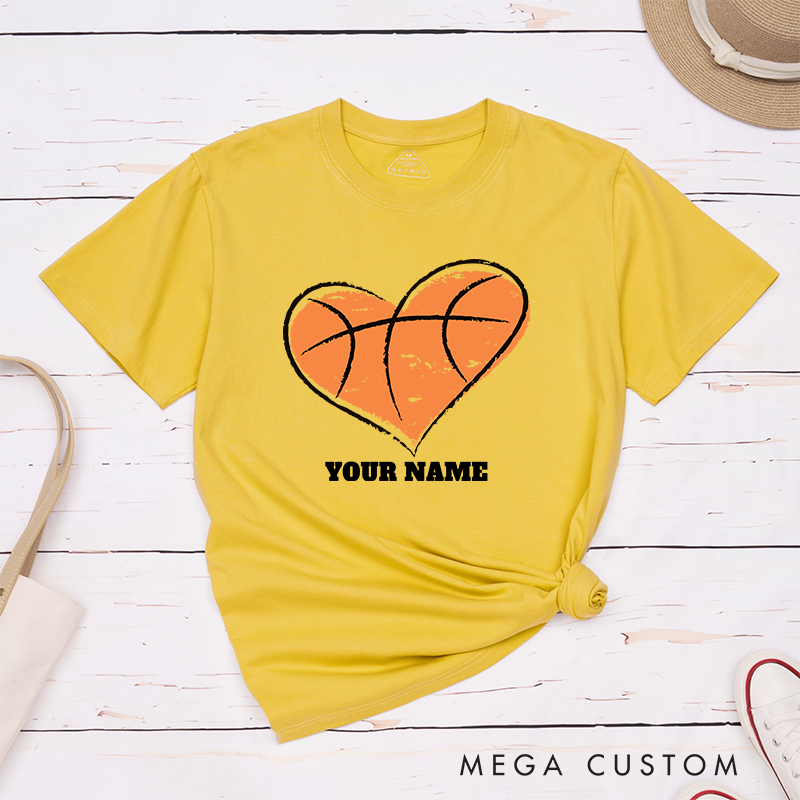 Personalized Basketball T-Shirt Design Featuring Heart Shaped Basketball Graphic Customizable Name Bold Text and Distressed Artistic Style