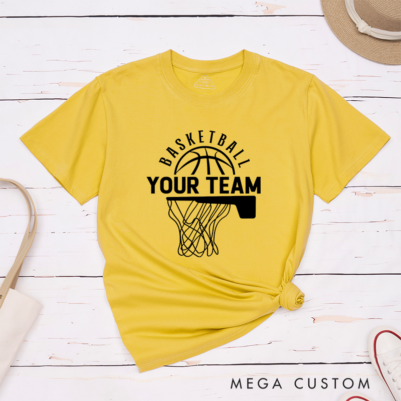 Personalized Basketball T-Shirt Design Showcasing Custom Team Name Bold Basketball Graphic Dynamic Hoop and Net Illustration and Stylish Arched Text Layout