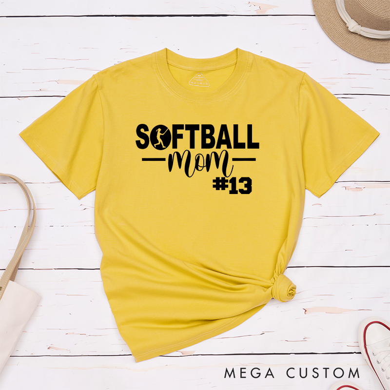 Personalized Softball Mom T-Shirt Design Featuring Bold Text Player Number and a Stylish Softball Silhouette Graphic