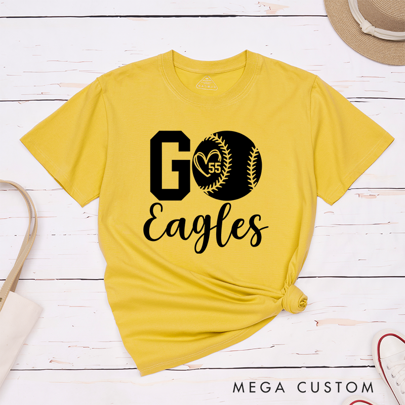 Personalized Softball Spirit T-Shirt Design Featuring Bold "Go" Text Team Name in Elegant Script Heart-Shaped Player Number Inside a Softball Graphic Perfect for Fans and Players
