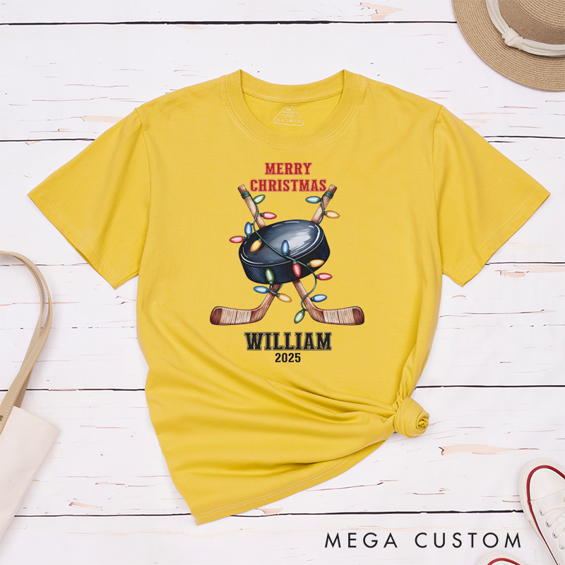 Personalized Christmas Hockey T-Shirt with Custom Name, Year, and Festive Holiday Lights Design
