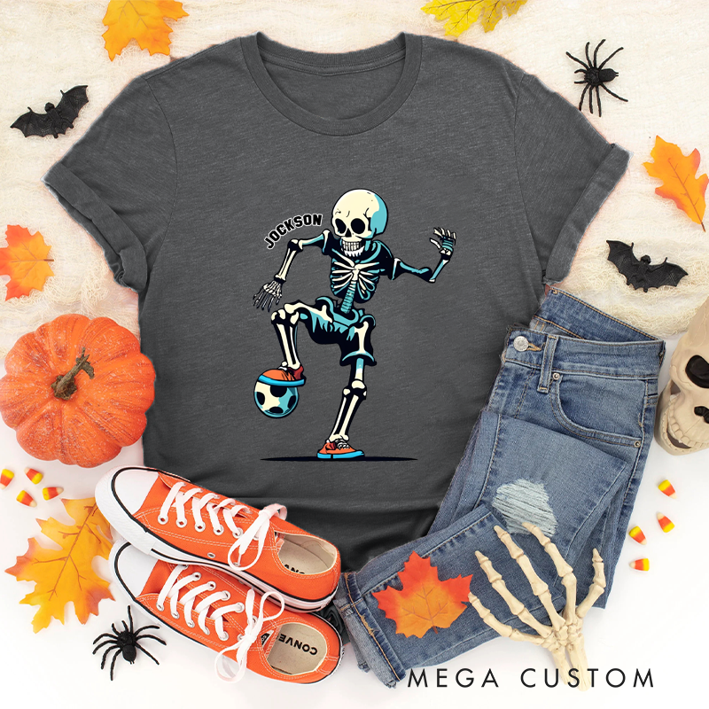 Personalized Halloween Soccer T-Shirt with Skeleton Kicking a Ball and Custom Name Design