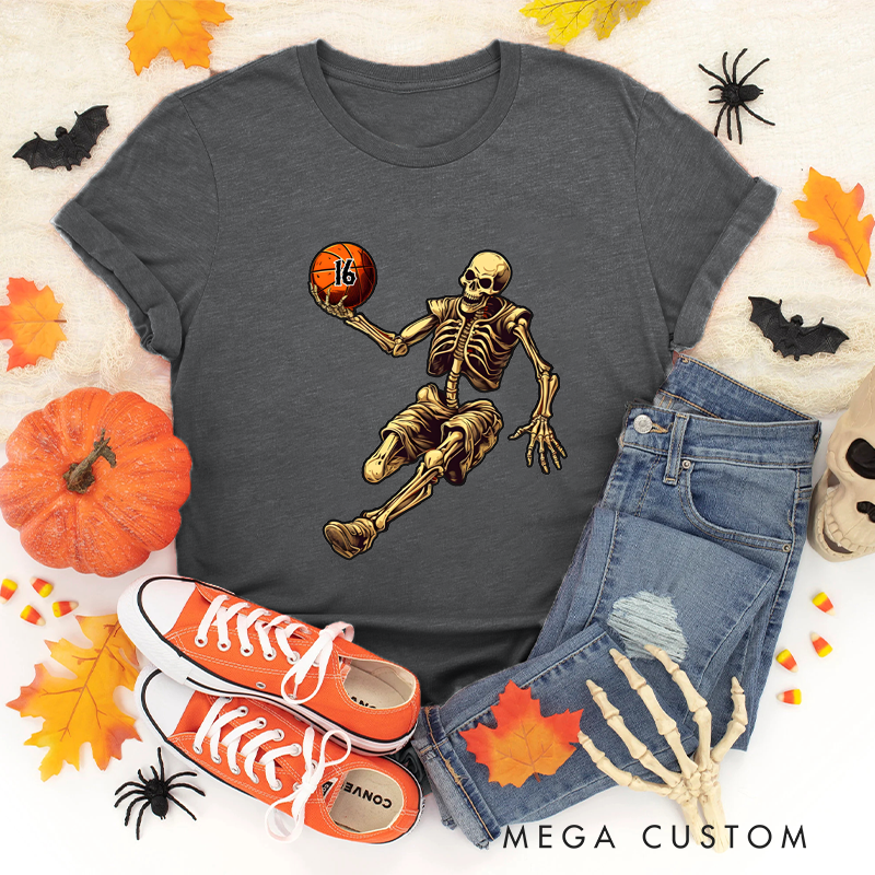 Personalized Halloween Basketball T-Shirt with Skeleton Dribbling Pumpkin Ball and Customizable Number Design