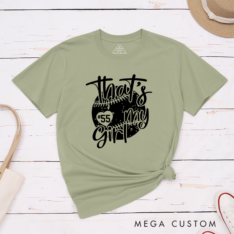 Personalized Softball T-Shirt Design Featuring Customizable Player Number Heart-Shaped Accent Playful Handwritten Script Font and Distressed Softball Graphic for a Stylish and Sentimental Look