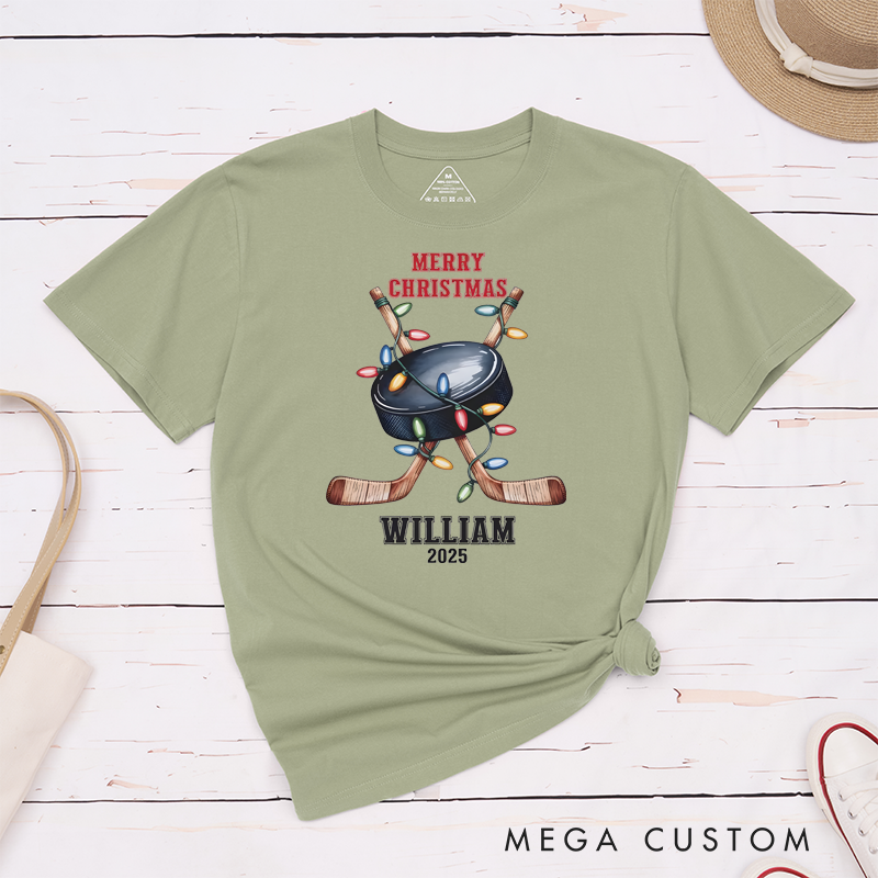 Personalized Christmas Hockey T-Shirt with Custom Name, Year, and Festive Holiday Lights Design