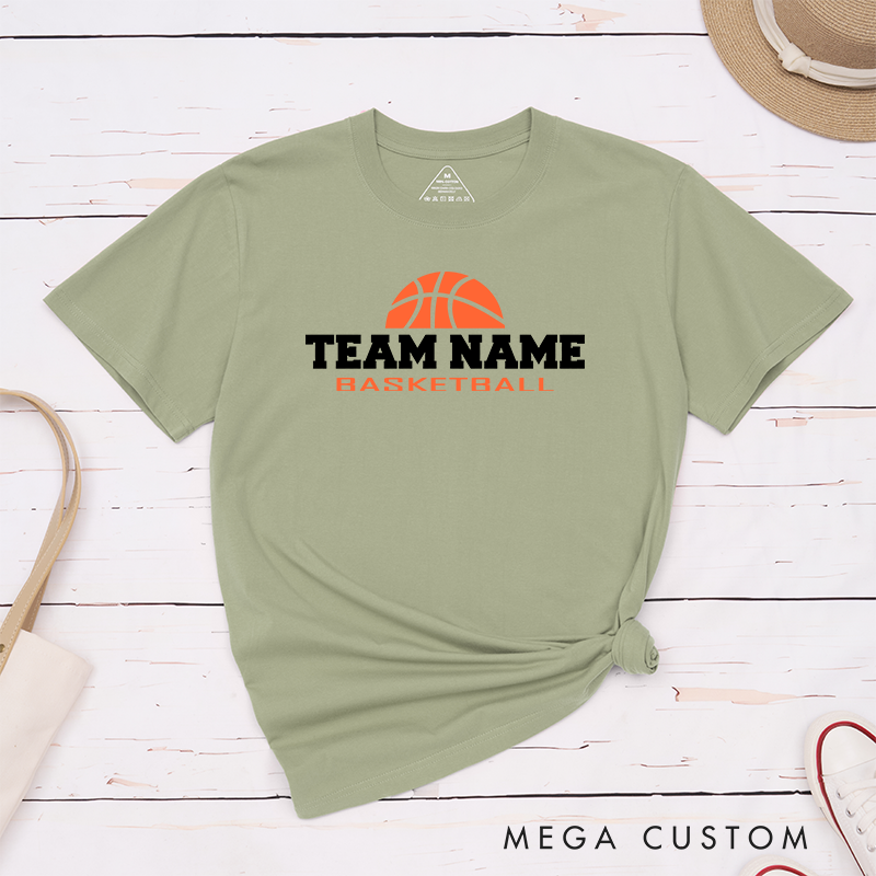 Personalized Basketball Team T-Shirt Design Showcasing Bold Team Name Text and a Striking Orange Basketball Graphic for a Sporty and Dynamic Look