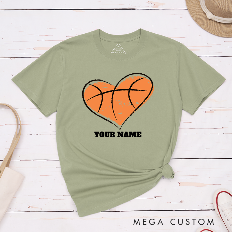 Personalized Basketball T-Shirt Design Featuring Heart Shaped Basketball Graphic Customizable Name Bold Text and Distressed Artistic Style