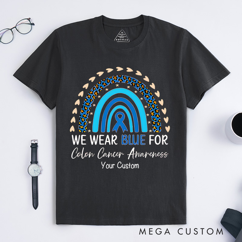 Personalized We Wear Blue Rainbow and Ribbon Design Supporting Colon Cancer Awareness and Unity T-shirt