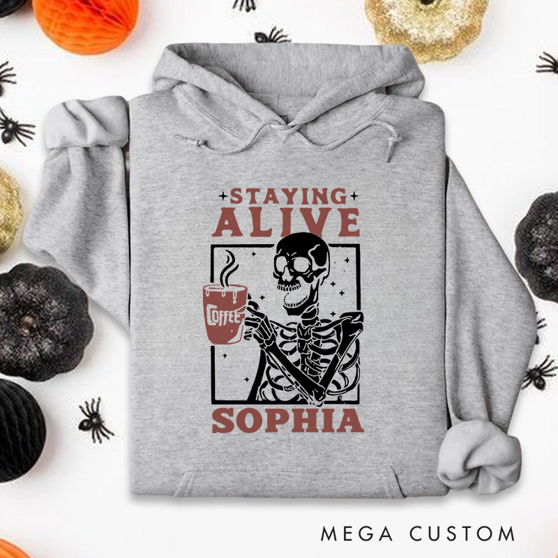 Personalized Skeleton Drinking Coffee Staying Alive Halloween Vibes Hoodies