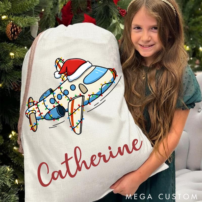 Personalized Travel Christmas Sack with Santa Hat Plane Gift for Travel Lovers and Custom Name