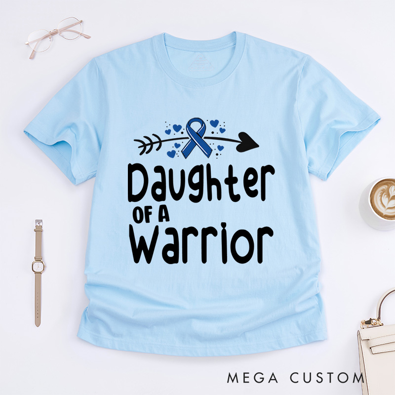 "Daughter of a Warrior" T-shirt celebrating resilience and strength with a ribbon and arrow Colon Cancer.