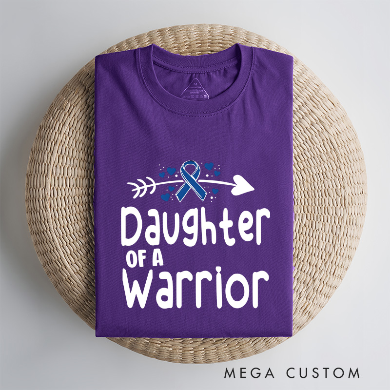 "Daughter of a Warrior" T-shirt celebrating resilience and strength with a ribbon and arrow Colon Cancer.