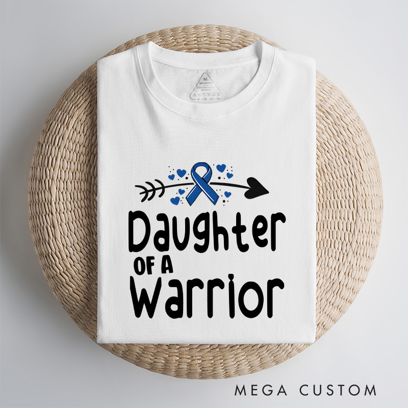 "Daughter of a Warrior" T-shirt celebrating resilience and strength with a ribbon and arrow Colon Cancer.