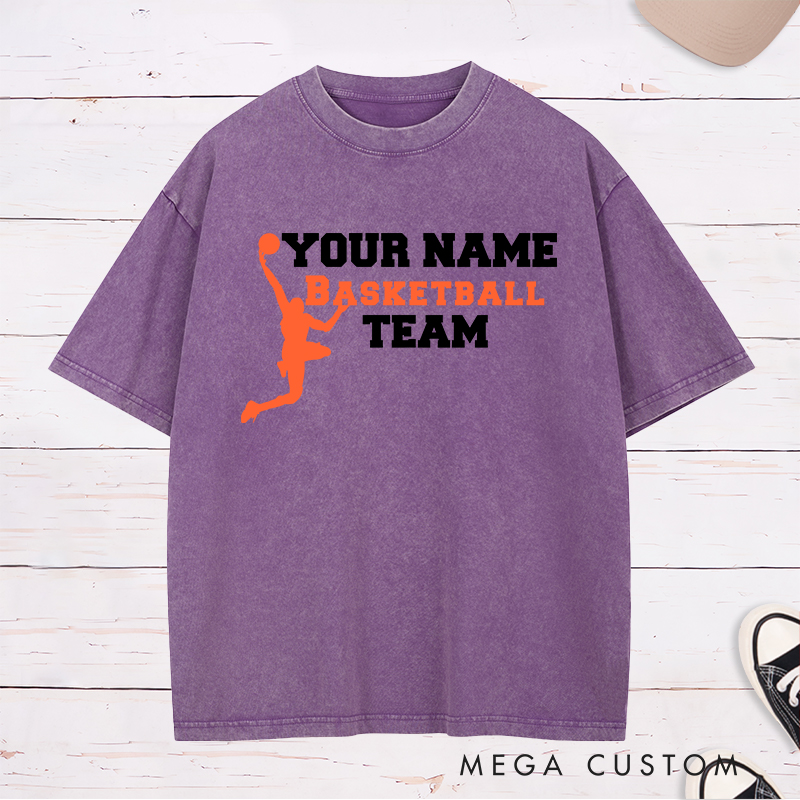 Personalized Basketball Team Washed T-Shirt Design Featuring a Dynamic Dunking Player Silhouette with Customizable Team Name for a Bold and Unique Look