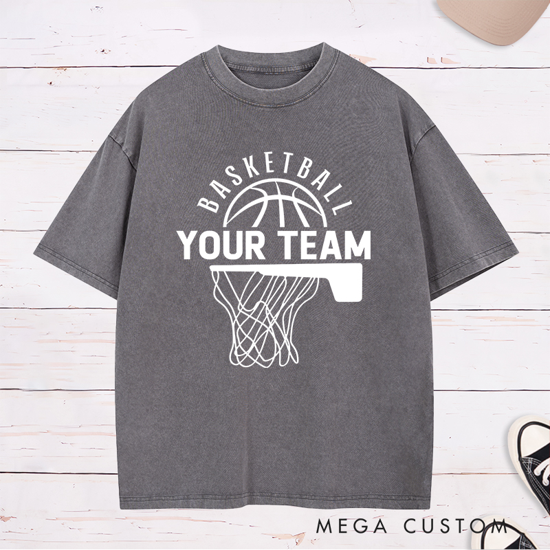 Personalized Washed T-Shirt Design Featuring a Basketball Hoop and Arched Basketball Text with a Customizable Team Name