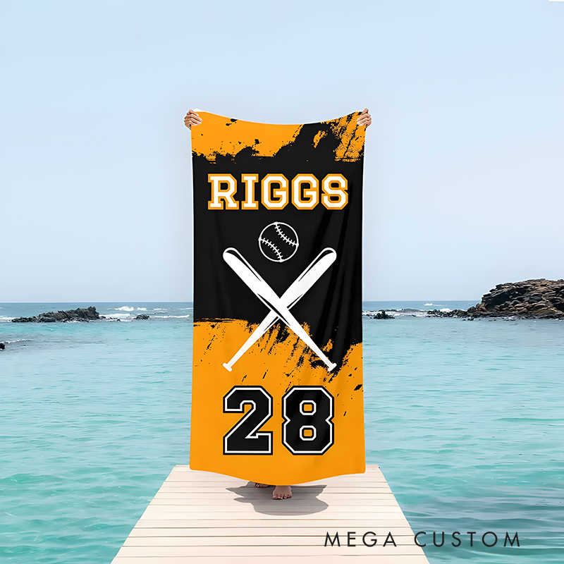 Personalized baseball beach towel featuring a custom name jersey number crossed bats and a baseball graphic perfect for sports enthusiasts and beach lovers