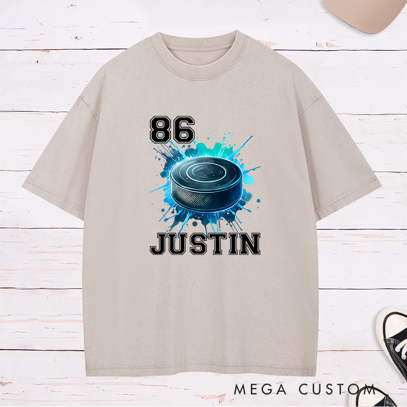 Personalized Athletic Washed T-Shirt Featuring a Vibrant Hockey Puck Graphic and Custom Name