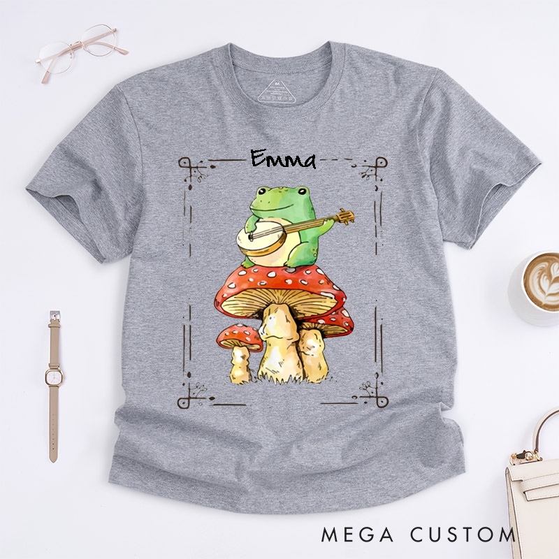 Personalized Frog Playing Banjo Classic T-Shirts Cute Mushroom Art Gift for Music Lovers Nature Fans Unisex Custom Tee Whimsical Forest Illustration