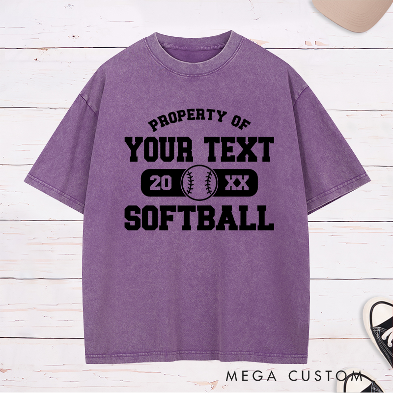 Personalized "Property of" Softball Washed T-Shirt Design Featuring Custom Text Year and Central Softball Graphic for a Classic Team Look
