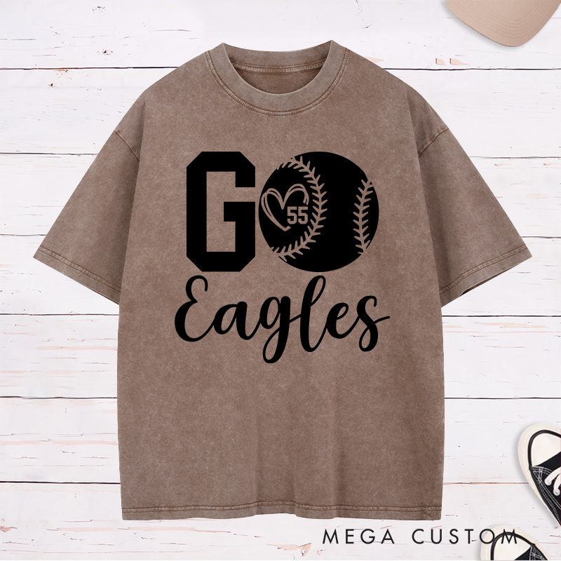 Personalized Softball Spirit Washed T-Shirt Design Featuring Bold "Go" Text Team Name in Elegant Script Heart-Shaped Player Number Inside a Softball Graphic Perfect for Fans and Players