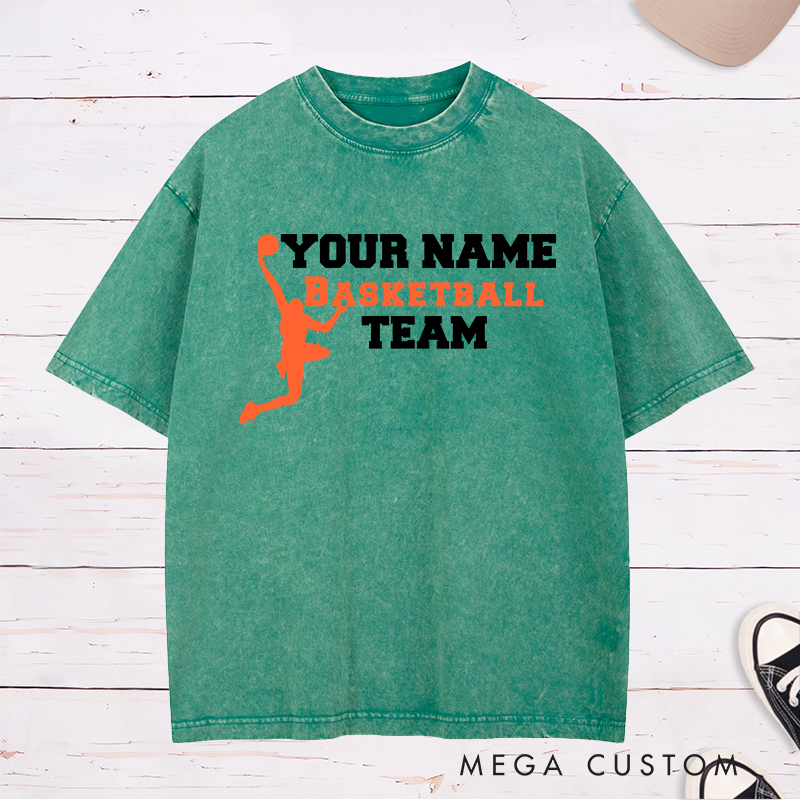 Personalized Basketball Team Washed T-Shirt Design Featuring a Dynamic Dunking Player Silhouette with Customizable Team Name for a Bold and Unique Look