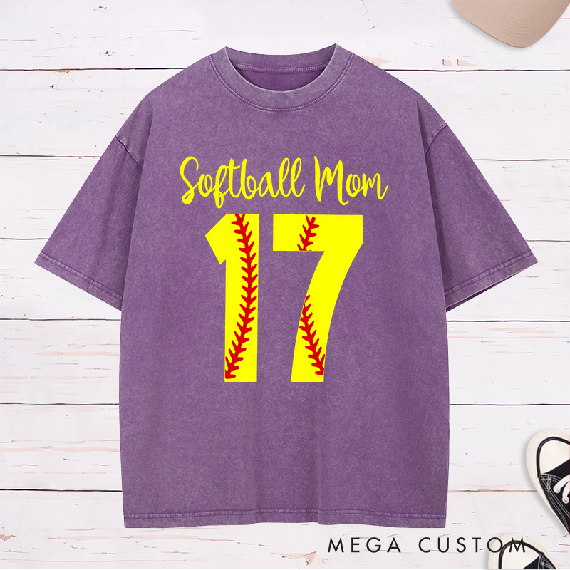 Personalized Softball Mom Washed T-Shirt Design Featuring Customizable Player Number with Red Stitch Softball Pattern and Stylish Yellow Script Text