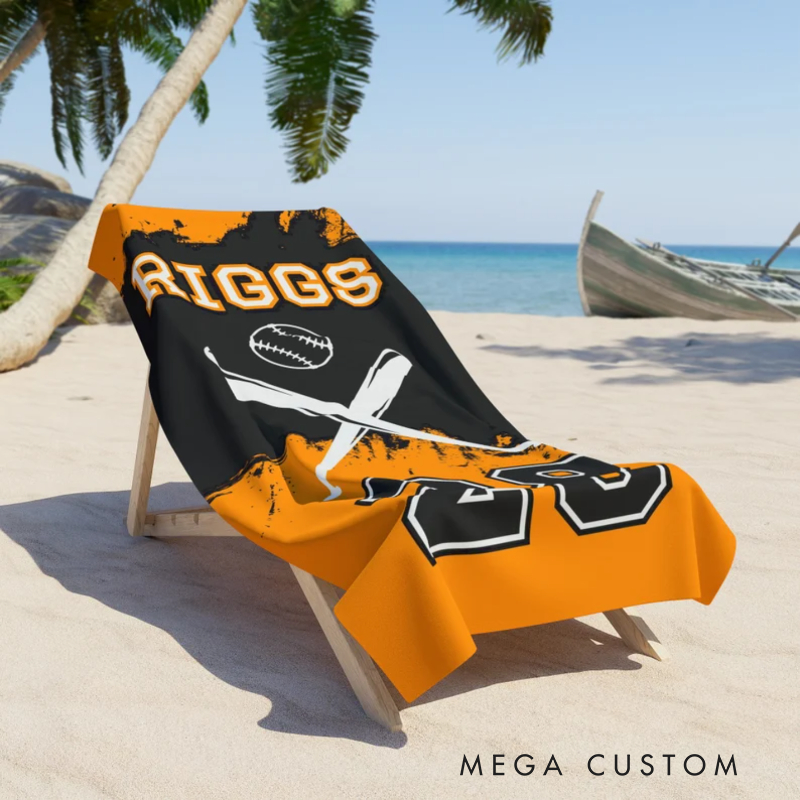 Personalized baseball beach towel featuring a custom name jersey number crossed bats and a baseball graphic perfect for sports enthusiasts and beach lovers