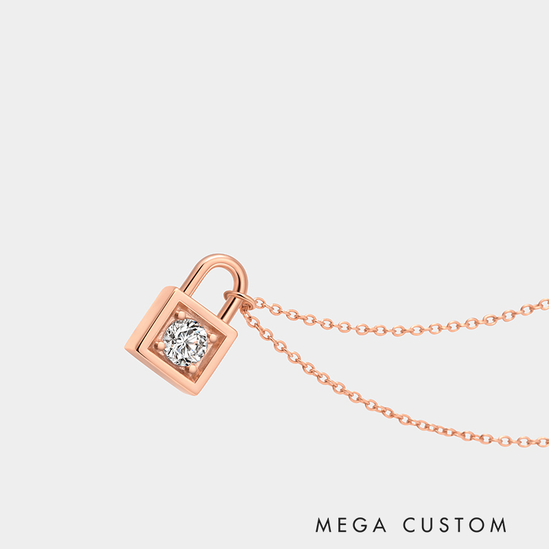 Personalized sterling silver lock necklace – customizable with engraving and a birthstone pendant.