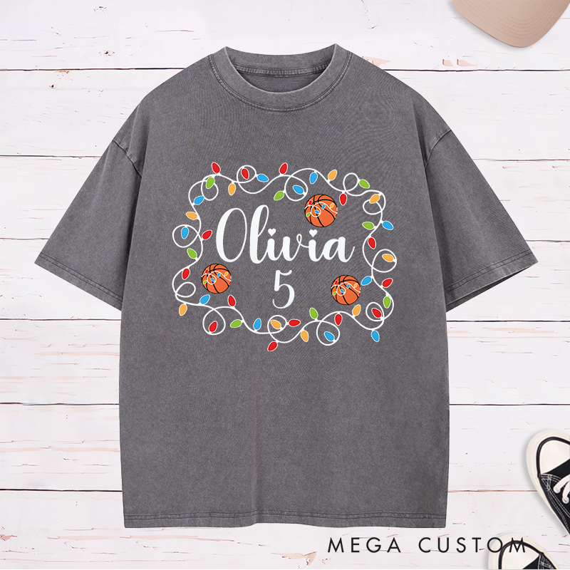 Personalized Washed Christmas T-Shirt with Custom Name, Number, Basketballs, and String Lights Design