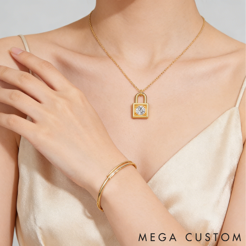 Personalized sterling silver lock necklace – customizable with engraving and a birthstone pendant.