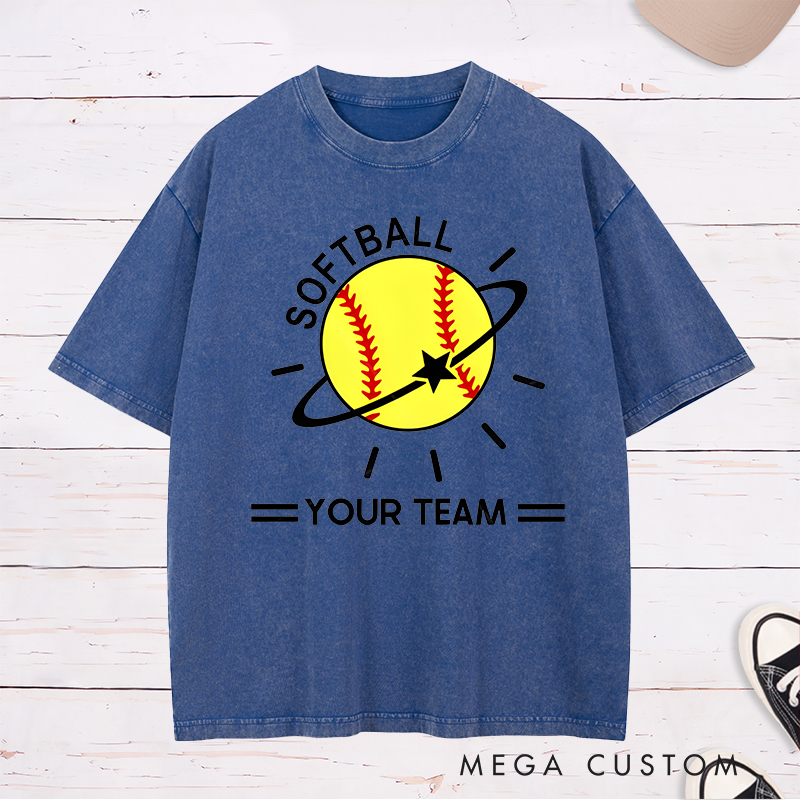 Personalized Softball Team Washed T-Shirt Design Featuring Customizable Team Name Vibrant Softball Graphic with Orbiting Star and Radiating Lines