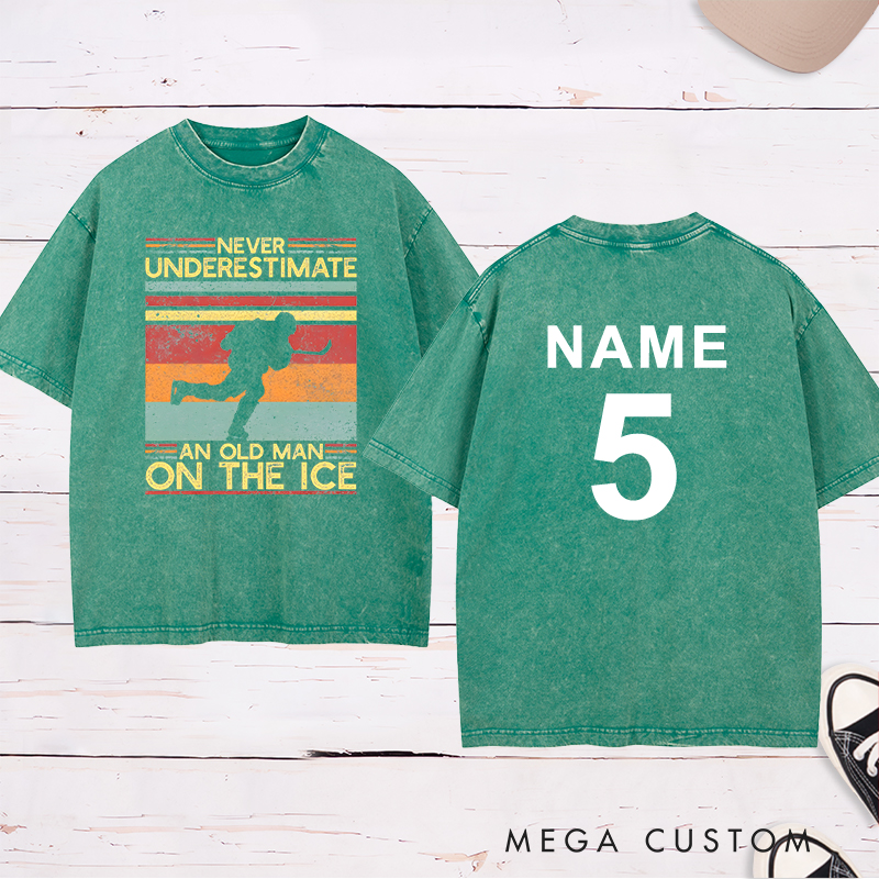 Personalized "Never Underestimate an Old Man on the Ice" Hockey Washed T-Shirt with Custom Name and Number