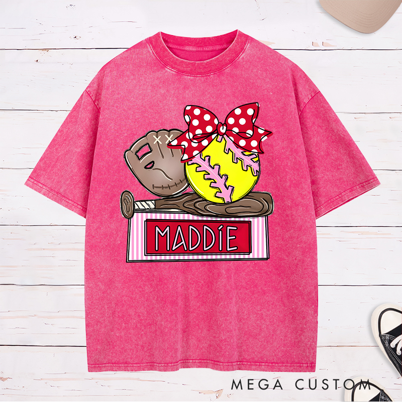 Personalized Softball Washed T-Shirt Design Featuring Custom Name Bright Softball Graphic and Playful Bow Accent