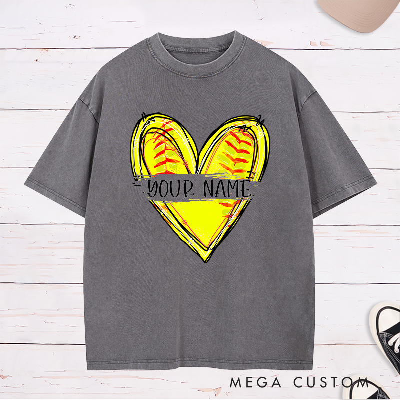 Personalized Softball Heart Washed T-Shirt Design Featuring Customizable Name with Bright Yellow Softball Stitching Graphic