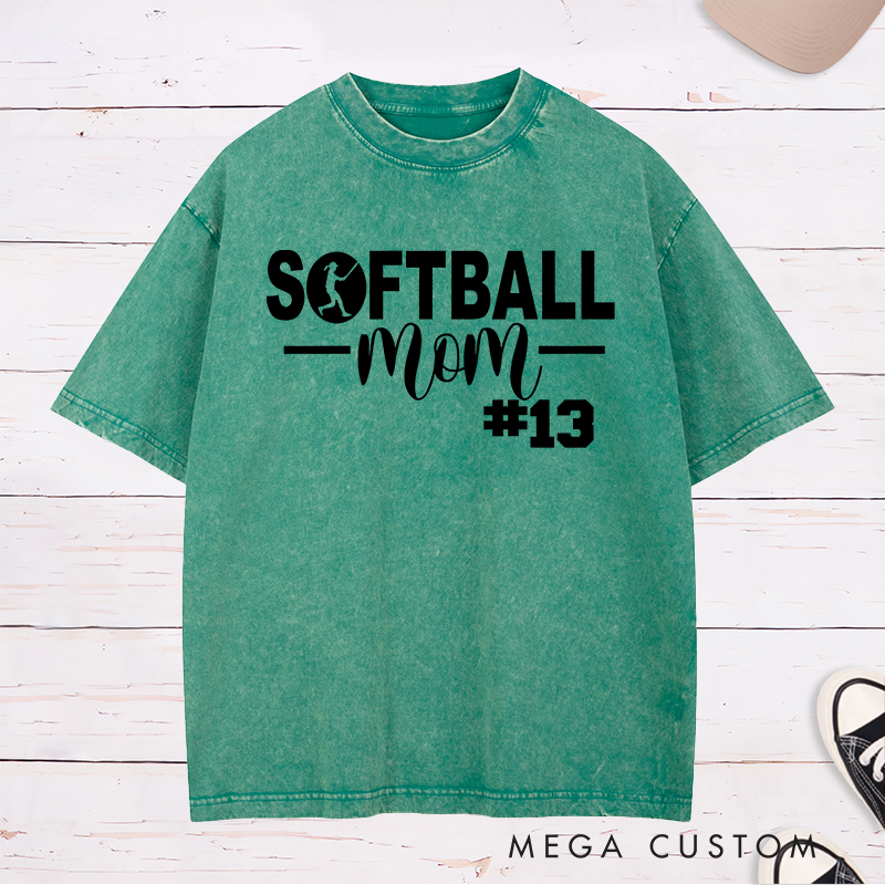 Personalized Softball Mom Washed T-Shirt Design Featuring Bold Text Player Number and a Stylish Softball Silhouette Graphic