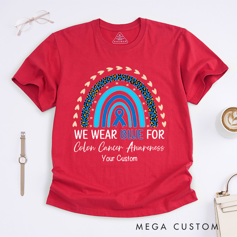 Personalized We Wear Blue Rainbow and Ribbon Design Supporting Colon Cancer Awareness and Unity T-shirt