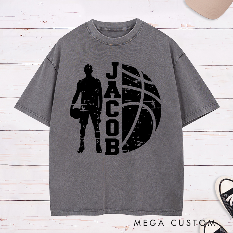 Personalized Washed T-Shirt Design Featuring a Distressed Basketball Player Silhouette with Customizable Vertical Name and Bold Graphic Style