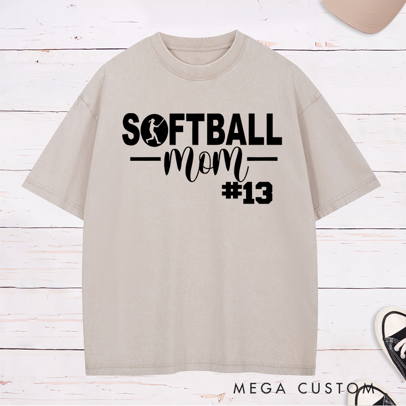 Personalized Softball Mom Washed T-Shirt Design Featuring Bold Text Player Number and a Stylish Softball Silhouette Graphic