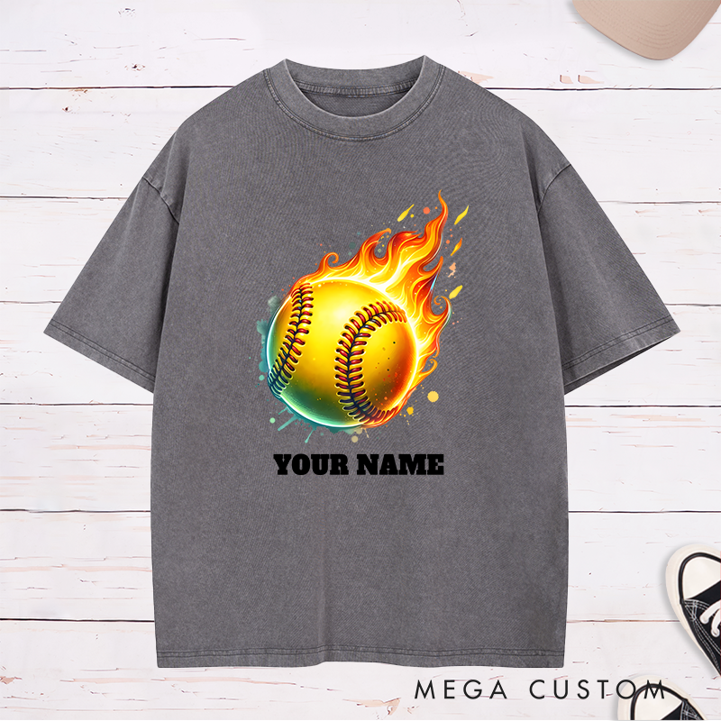 Personalized Fiery Softball Washed T-Shirt Design Customizable Name Featuring a Dynamic Flaming Softball Graphic Perfect for Teams and Players