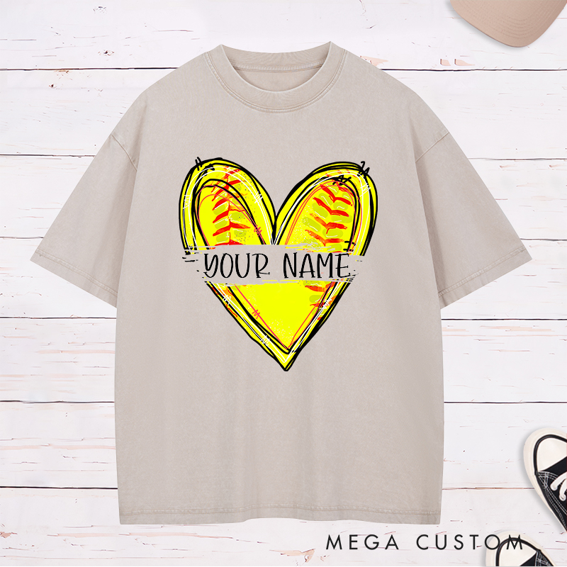Personalized Softball Heart Washed T-Shirt Design Featuring Customizable Name with Bright Yellow Softball Stitching Graphic